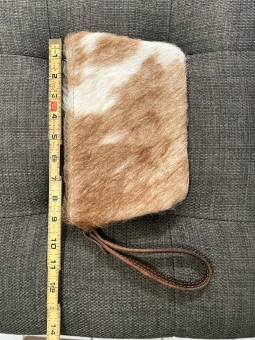 CANOE genuine cow hide wristlet.